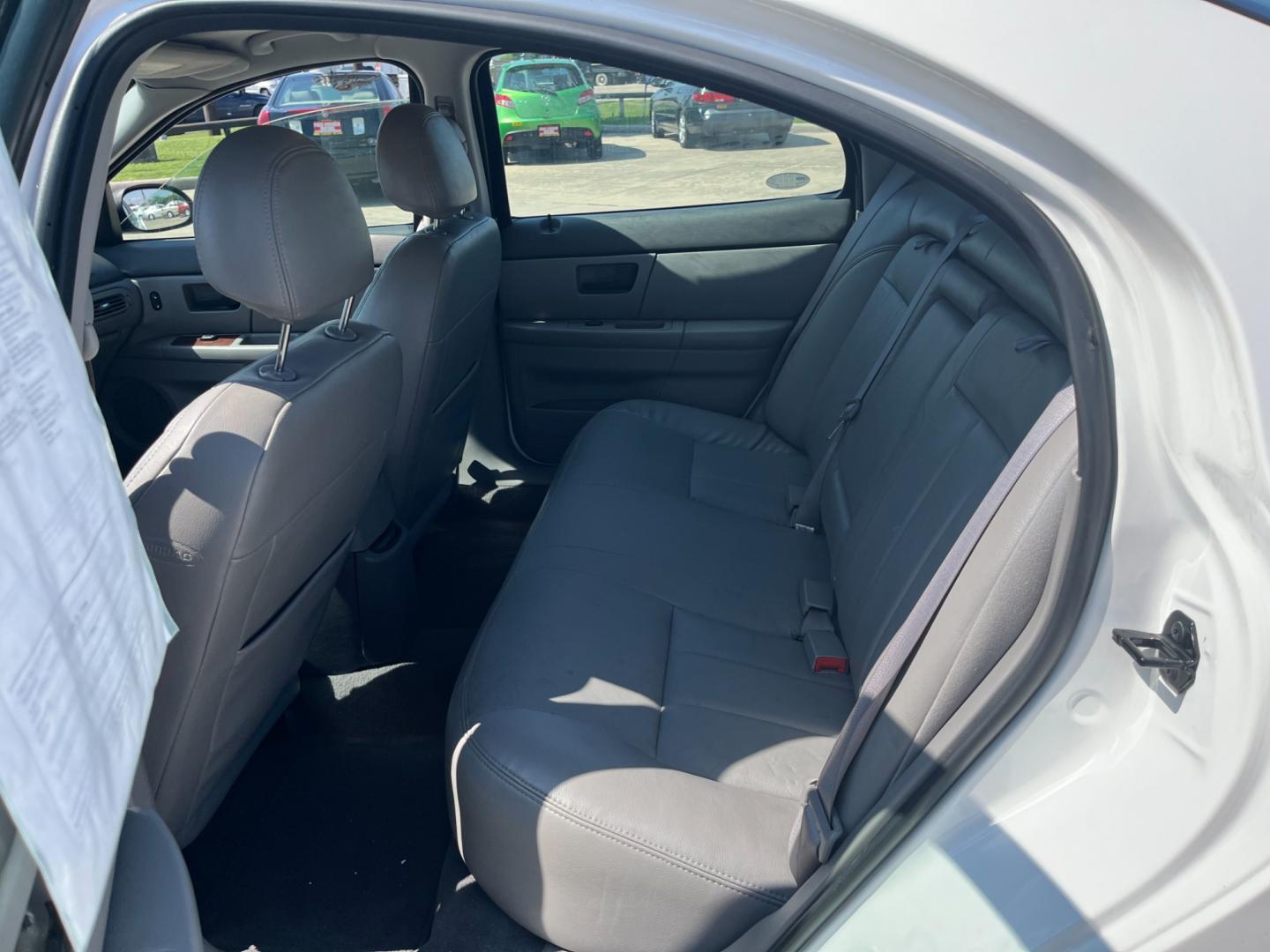 2004 white /TAN Mercury Sable LS Premium (1MEHM55S54A) with an 3.0L V6 SOHC 24V engine, 4-Speed Automatic Overdrive transmission, located at 14700 Tomball Parkway 249, Houston, TX, 77086, (281) 444-2200, 29.928619, -95.504074 - Photo#9